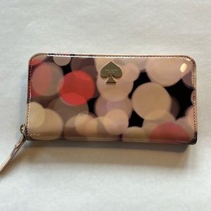 Kate Spade Continental Patent Leather wallet with zip-around closure